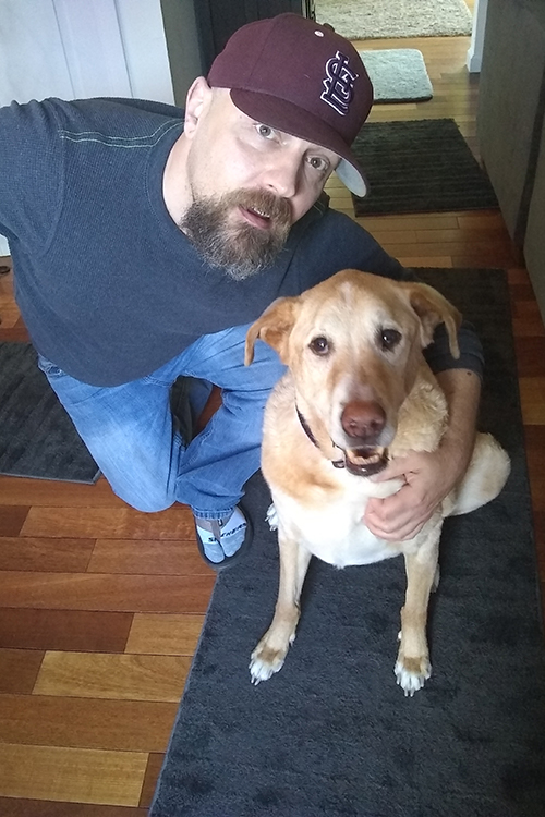 Devin with his dog Quixote