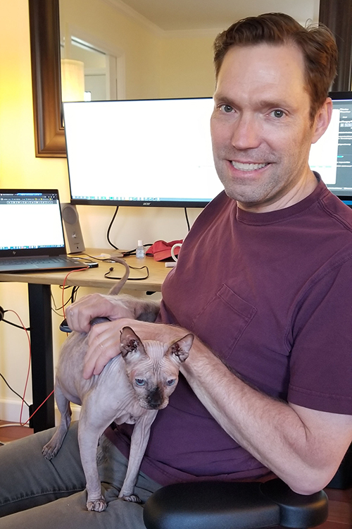 Scott Merritt and his cat Lucy