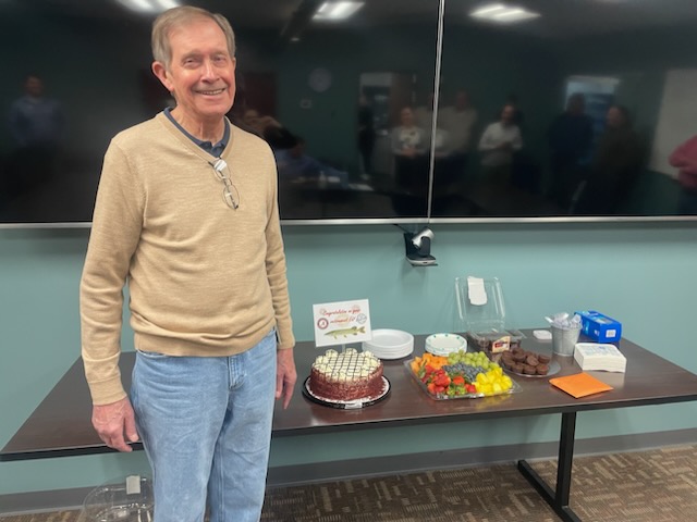 Employee with cake